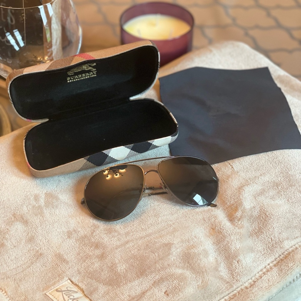 These authentic Burberry shades are gently used and are great for the sunshine.